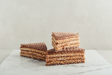 Waffle cake made of crispy waffle cakes with boiled condensed milk
