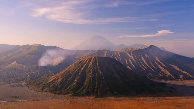Epic eruption of Volcano Bromo at sunrise. Java Island, Indonesia. Time lapse