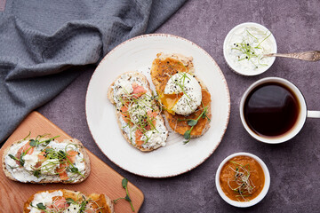  Sandwiches with zucchini spread and greek yogurt, egg, salmon, coffee cup. Low in calories, FODMAP, KETO diet, superfood flat lay.
