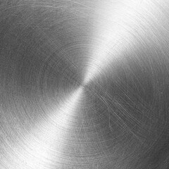 Stainless steel or aluminium circular brushed shiny metal texture. Abstract metallic background....
