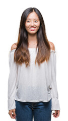 Obraz premium Young asian woman over isolated background with a happy and cool smile on face. Lucky person.