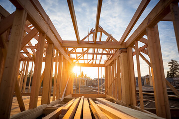 In building area of new construction home improvement project, unfinished framing beams are visible on wooden house I Generation