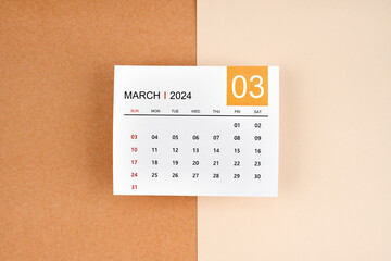 March 2024 calendar page on yellow. - obrazy, fototapety, plakaty