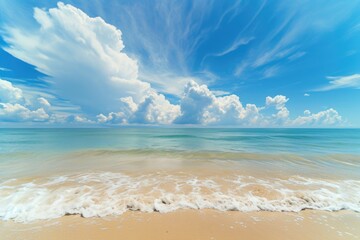 A beautiful view of the ocean from a sandy beach. Perfect for travel and vacation themes