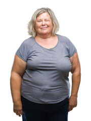 Senior plus size caucasian woman over isolated background winking looking at the camera with sexy...