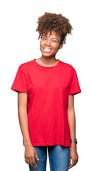 Beautiful young african american woman over isolated background winking looking at the camera with...