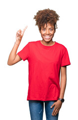 Beautiful young african american woman over isolated background showing and pointing up with finger number one while smiling confident and happy.