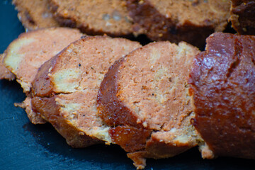 Vegan meatloaf  made of chickpeas and vital wheat gluten, spices.  Glazedm rubbed and roasted