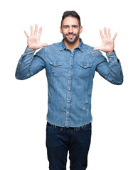 Fototapeta premium Young handsome man over isolated background showing and pointing up with fingers number ten while smiling confident and happy.