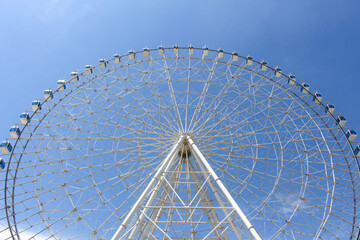 ferris wheel on a blue sky