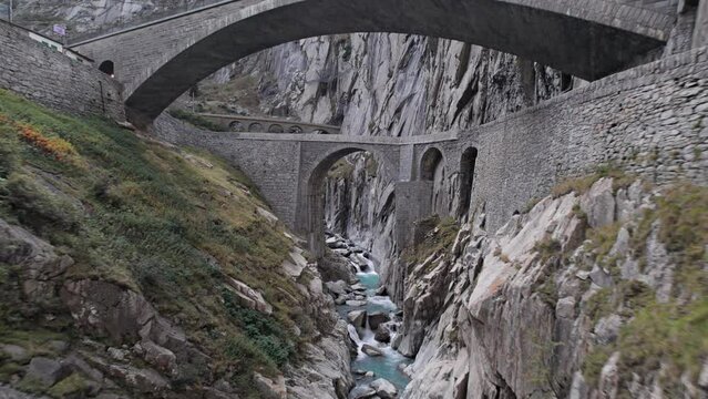 Aerial view of Devil's Bridge (Teufelsbrucke) over of Schollenen Gorge (Schollenenschlucht) in Andermatt, Switzerland