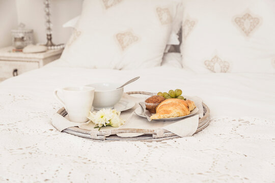 nicely set breakfast in bed
