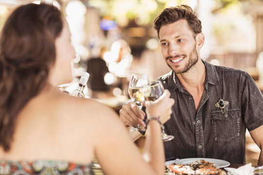 Romantic couple having a happy time at an outdoor restaurant.