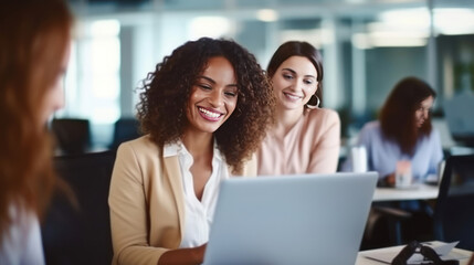 Obraz premium Happy multiethnic smiling business women working together in office.