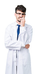 Young professional scientist man wearing white coat over isolated background looking stressed and nervous with hands on mouth biting nails. Anxiety problem.