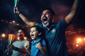 Excited father celebrates Indias cricket win with daughter.