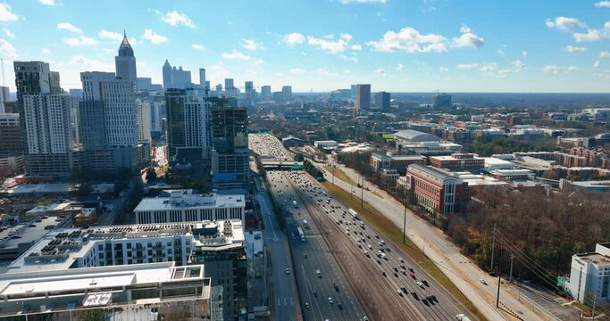 Downtown Atlanta, Georgia. Skyscrapers in the business center with Interstate 85 and general view of Georgia Institute of Technology. Aerial view.