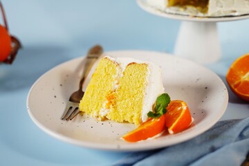 Homemade Mandarin orange cake with whipped cream frosting
