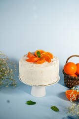Homemade Mandarin orange cake with whipped cream frosting