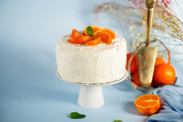 Homemade Mandarin orange cake with whipped cream frosting