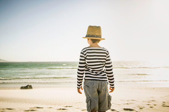 Young boy having fun playing on the beach