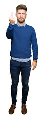 Young handsome bussines man Showing middle finger, impolite and rude fuck off expression