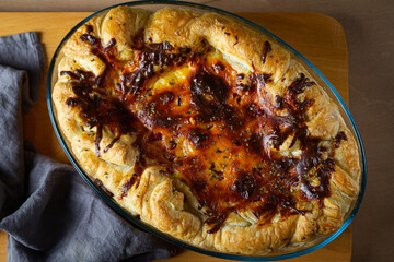 Pie with meat, potatoes and mushrooms