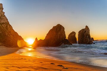 Sunset on the Portugal Ursa Beach, Praia da Ursa, 
the westernmost beach at atlantic coast of...