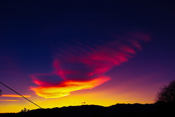 Colorful sunset in a windy sky