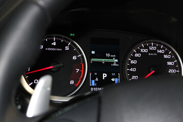 LED backlight of the digitized instrument scale on a dashboard of a modern car
