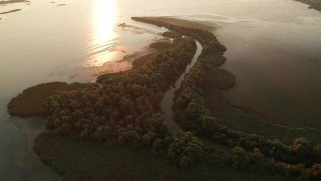 Sunrise in Danube Delta. 4K aerial video with a beautiful landscape from the amazing delta in Romania.