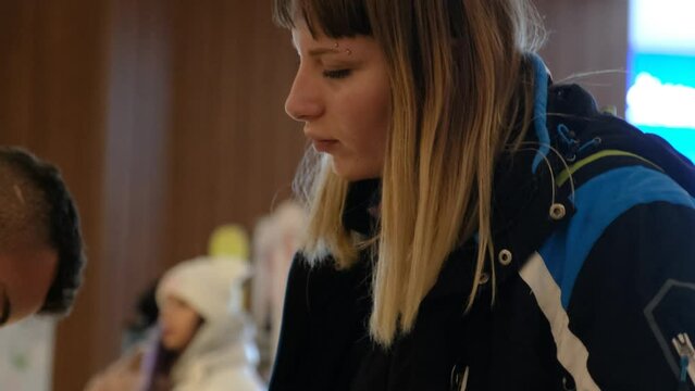 Women shopping and relaxing at ski stores