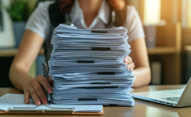 Stacks of paper files for searching information on work desk in office. - obrazy, fototapety, plakaty