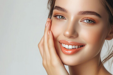 Skin care. Woman with beauty face touching healthy facial skin portrait. Beautiful smiling girl model with natural makeup touching her skin