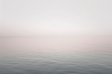 Fototapeta premium Misty sea horizon at dawn with soft light