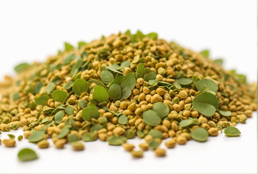 Fenugreek leaves with seeds on white background