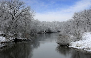 river in winter forest - 711665278