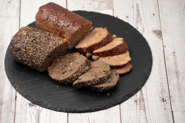 Vegan sausages made of vital wheat gluten and chickpeas, spices. Filled in vegan sausage casings, roasted