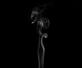 Obraz premium White smoke or steam smog moves on a black background. Beautiful gray smoke 