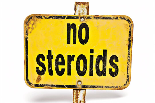 Yellow vintage sign with 'no steroids' text hanging on a chain