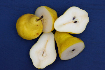 Naklejka na ściany i meble Group of whole and cut fresh Bartlett Pears