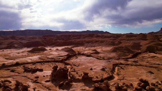 Panoramic aerial view to the Utah valley. Red rocky spires, natural phenomena, landscape of another planet, scenic Utah. Drone footage. Famous places of USA