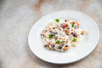 risotto seafood rice fresh delicious eating cooking appetizer meal food snack on the table copy space food background rustic top view