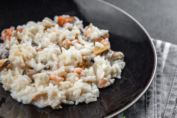 risotto seafood rice fresh delicious eating cooking appetizer meal food snack on the table copy space food background rustic top view