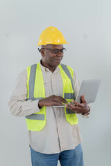  engineer handsome man or architect looking forward with white safety helmet in the office.