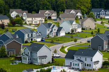 American dream homes as example of real estate development in US suburbs. View from above of...