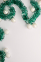 Vertical Christmas card with place for text on a white background.