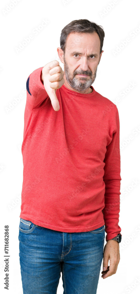 Poster handsome middle age hoary senior man wearing winter sweater over isolated background looking unhappy