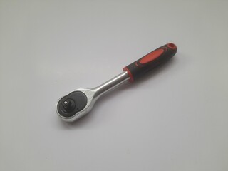ratchet socket wrench handle top view on white background