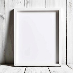 Minimalist White Wall Decor: Blank Picture Frame on Wood Wall